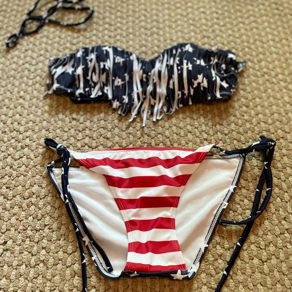 Patriotic bikini! Never worn, size small with removable pad inserts and strap.